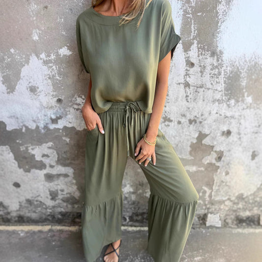 Conjunto de lino elegante con blusa fluida y pantalón relajado – ALTHEYA