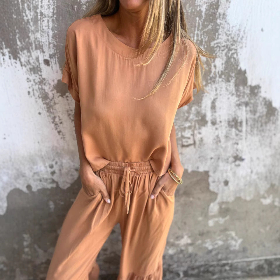 Conjunto de lino elegante con blusa fluida y pantalón relajado – ALTHEYA