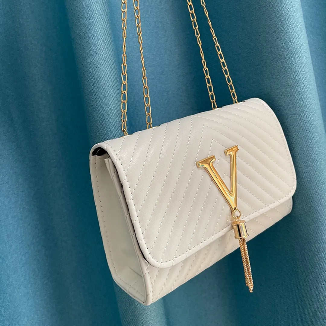 Bolso de mano con borla decorativa y diseño moderno – GLAMIRA