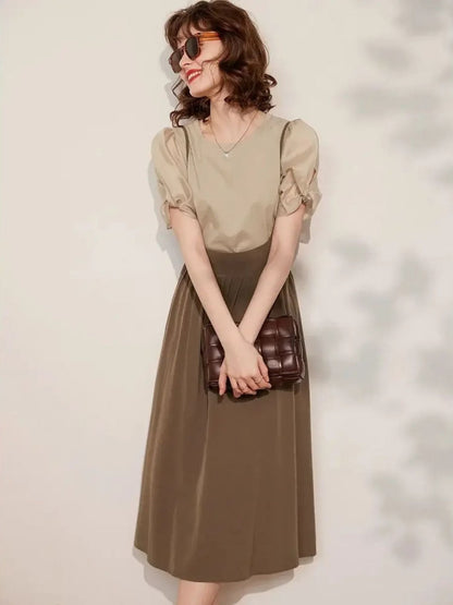 Conjunto de top con mangas abullonadas y falda midi – LIDIA