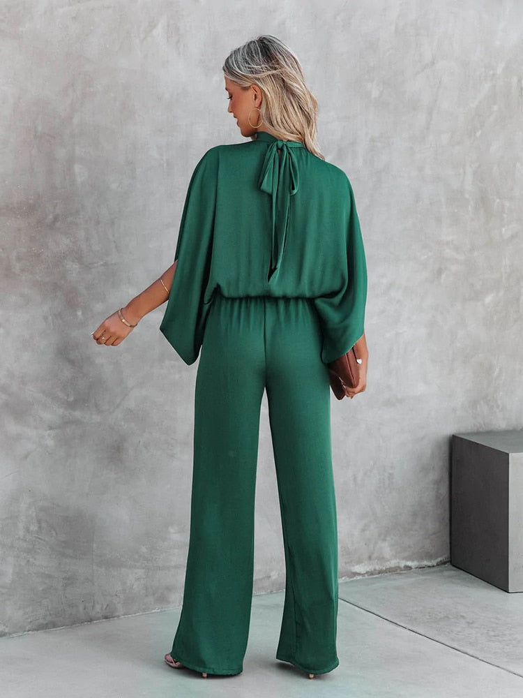 GRACELIA – Mono verde elegante para mujer con cuello alto