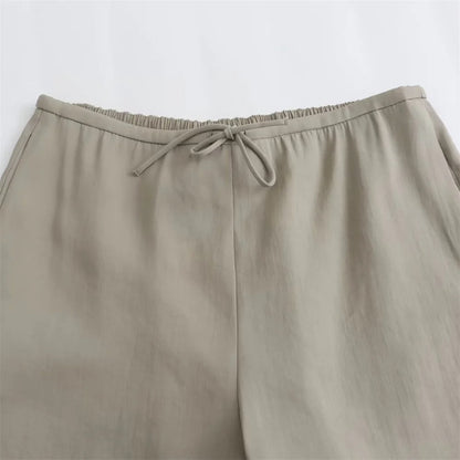 Conjunto elegante de blazer oversize y pantalón con cinturón – VALÉRIA